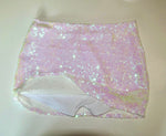 Handmade reversible sequin bikini bottom in shimmering pastel pink and white, flat lay
