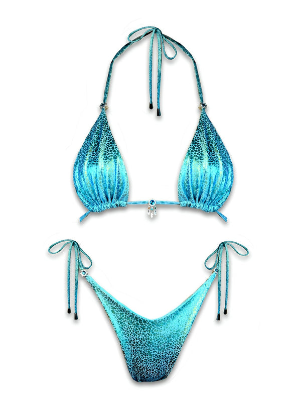 Blue reversible handmade bikini set with textured pattern and tie straps on white background