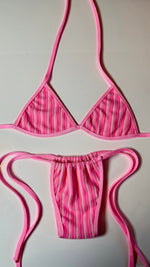Handmade pink striped reversible bikini set with triangle top and ruched bottoms on white background