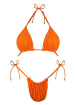 Bright orange handmade triangle bikini set with adjustable string ties, flat lay on white.