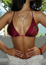 Handmade cherry beaded burgundy bikini top with layered necklaces, summer swimwear fashion
