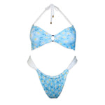 Blue floral reversible bikini set with white halter straps and ring detail, handmade swimwear
