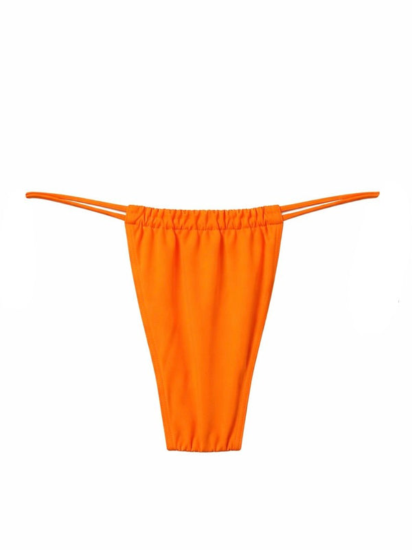 Handmade orange bikini bottom with string sides, sustainable swimwear on white background