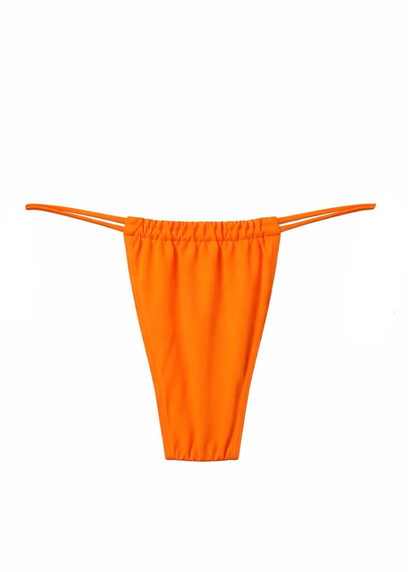 Handmade orange bikini bottom with string sides, sustainable swimwear on white background