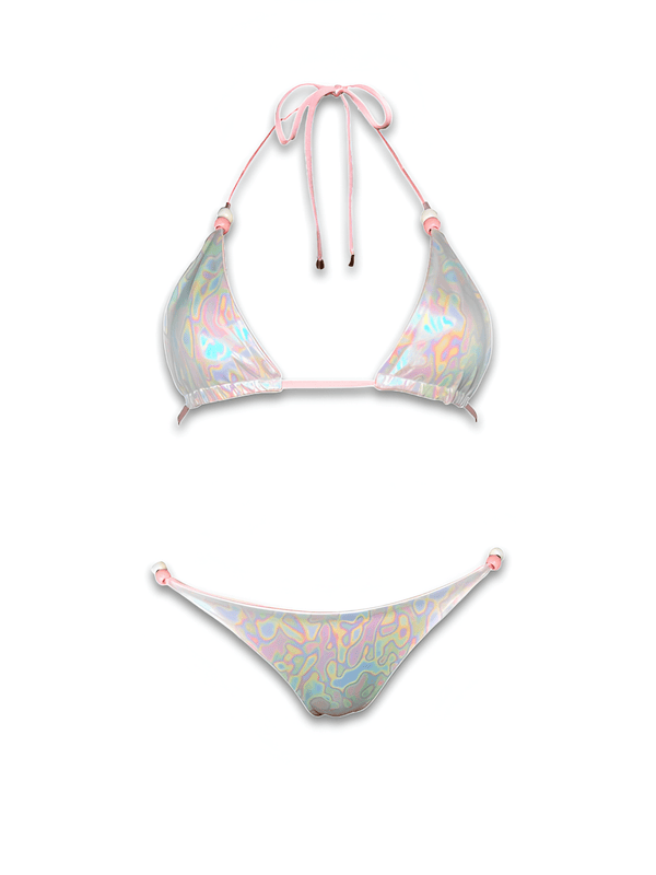 Iridescent pastel pink reversible bikini set with abstract pattern on white background